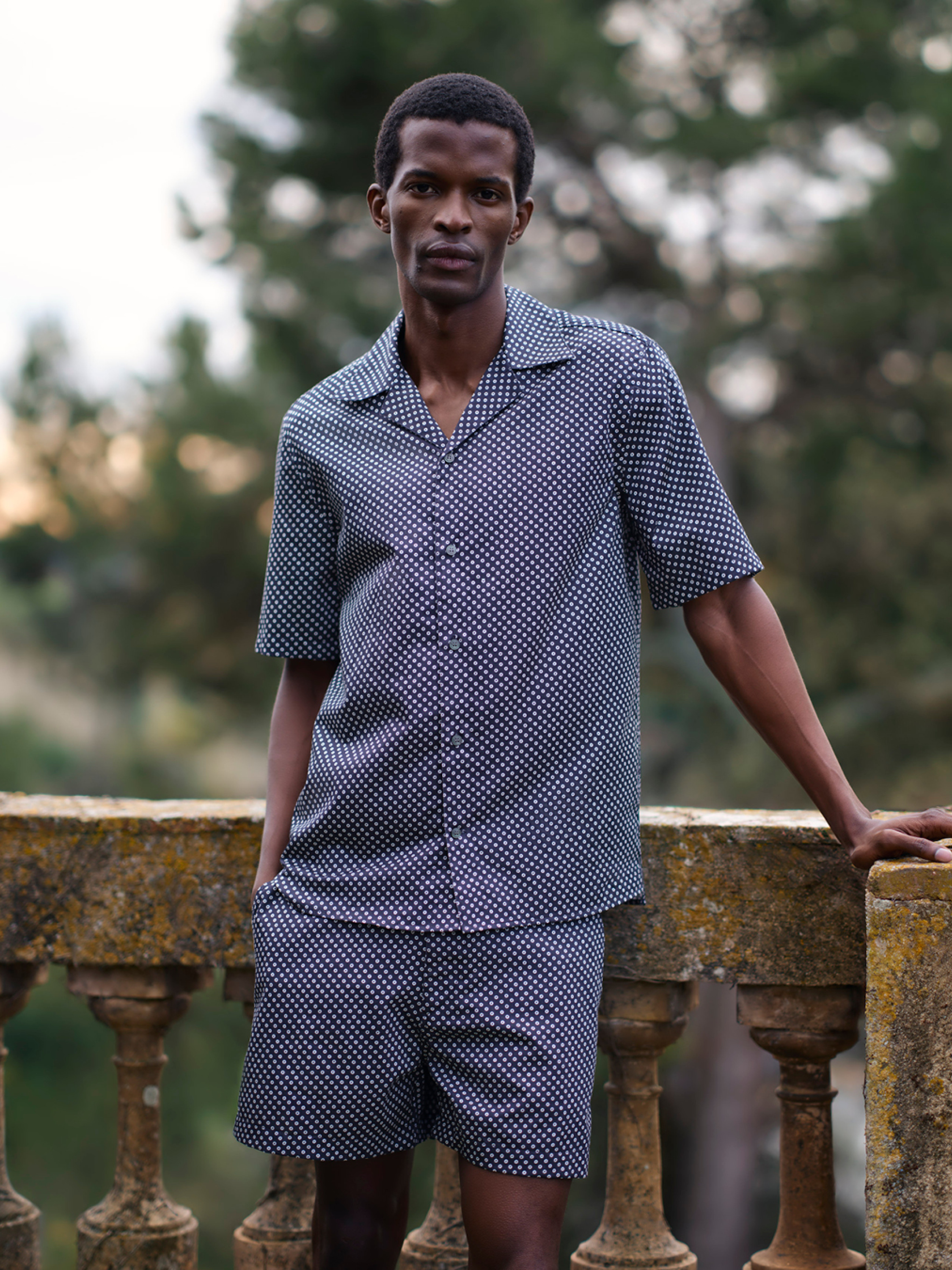 man in blue short and tshirt set